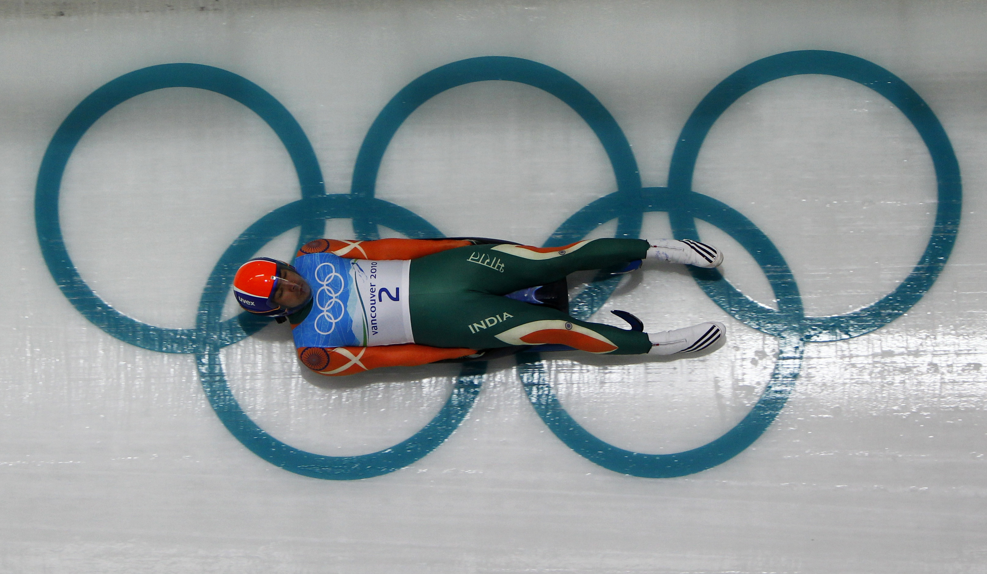 India's K.P. Keshavan speeds down the track during a training run for the men's singles luge in preparation for the Vancouver 2010 Winter Olympics in Whistler